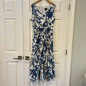 Beautiful dress! Only worn once. Soft, high, low hemline,lined,elastic waist.